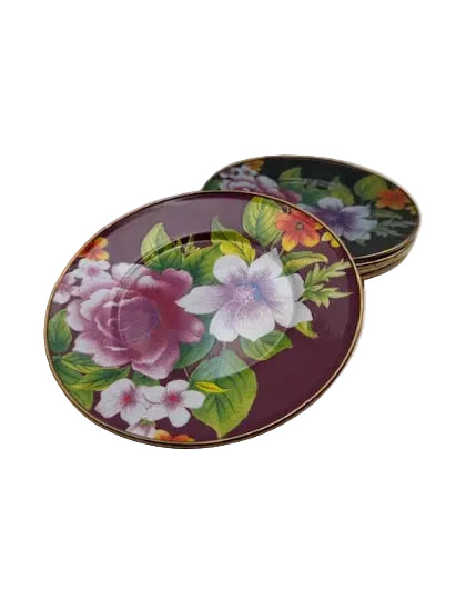 Angled stack of MacKenzie-Childs Flower Market salad plates showing maroon and black floral grounds