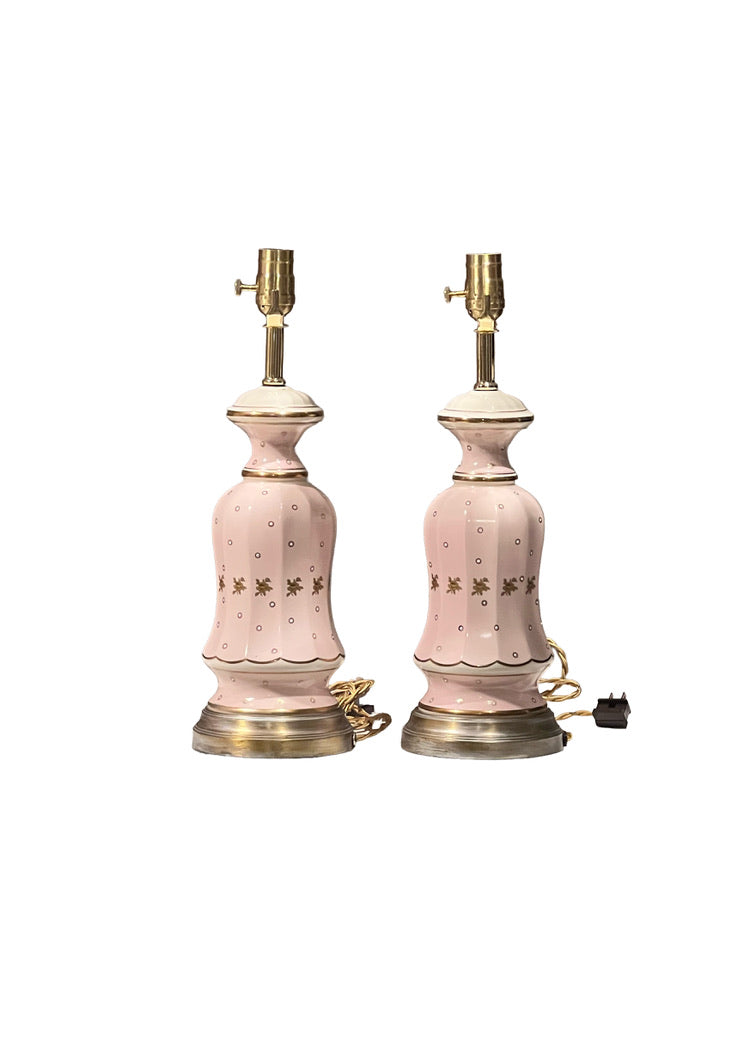 Pair of pink Regency table lamps showing brass bases and electrical cords