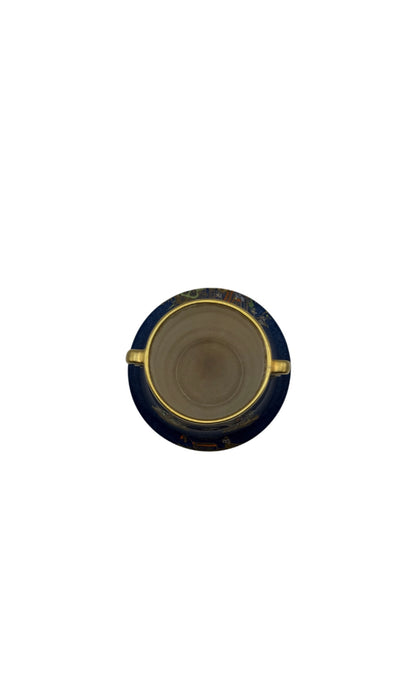 Top-down view into Carlton Ware cobalt vase showing cream glazed interior and gold rim