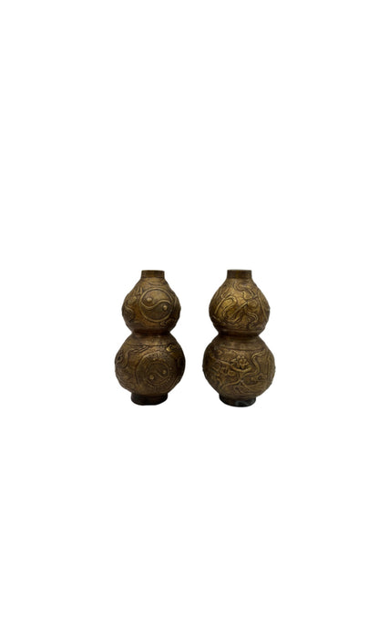 Vintage Asian brass double-gourd vases, pair with incised dragon and scroll decoration, front view