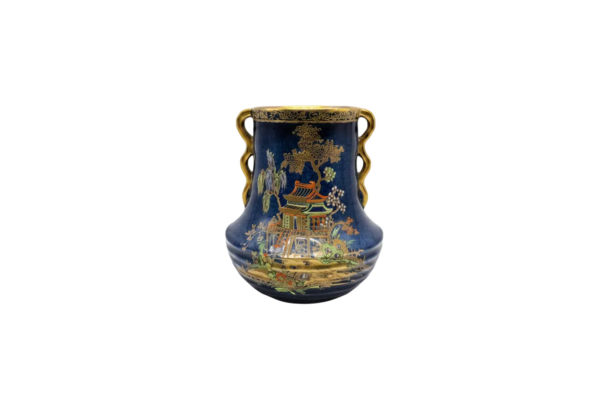 Carlton Ware chinoiserie vase, cobalt blue with gold pagoda and tree motifs, twin handles