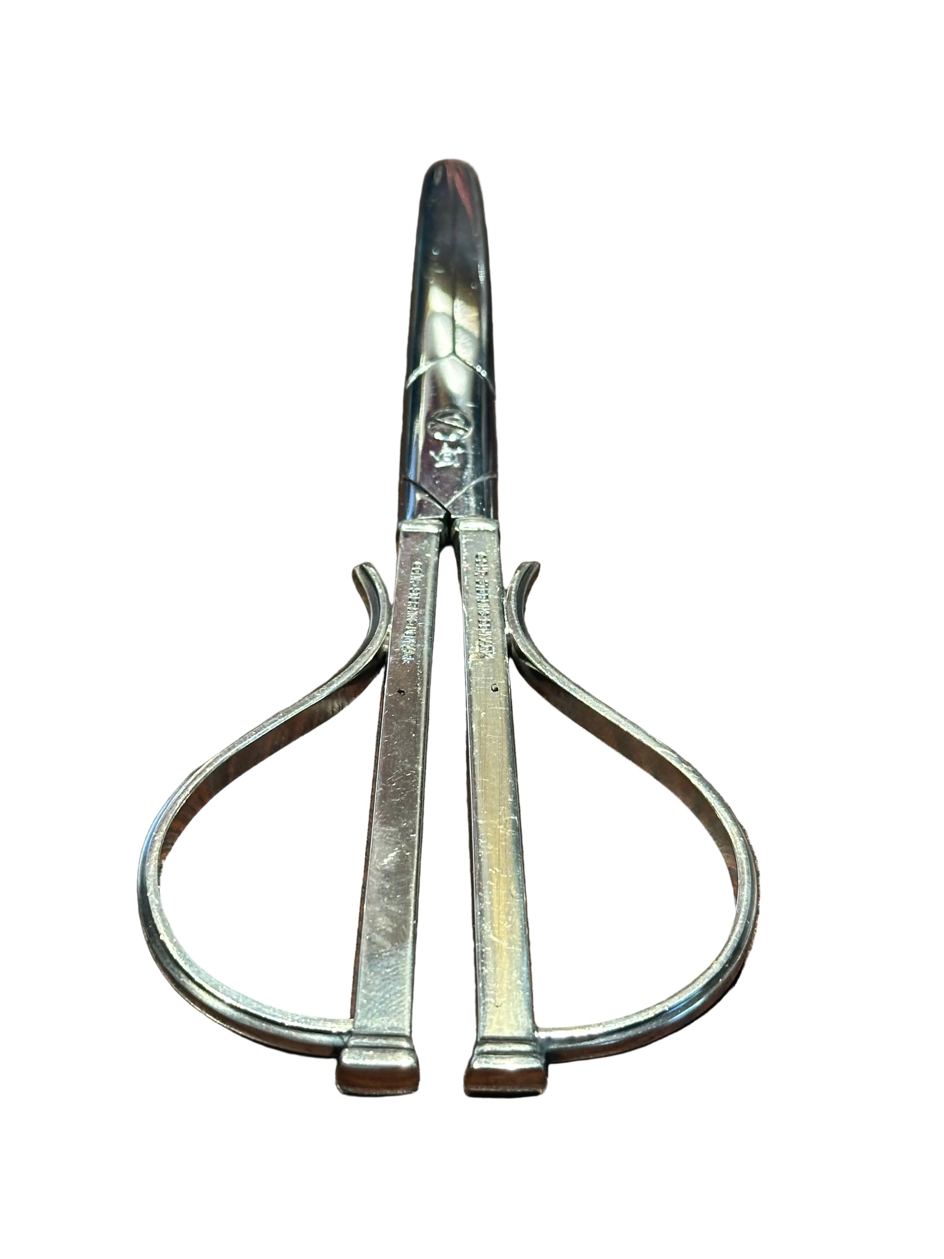 Cohr sterling silver grape shears open, showing two looped handles and stamped maker's marks