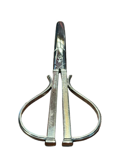 Cohr sterling silver grape shears open, showing two looped handles and stamped maker's marks