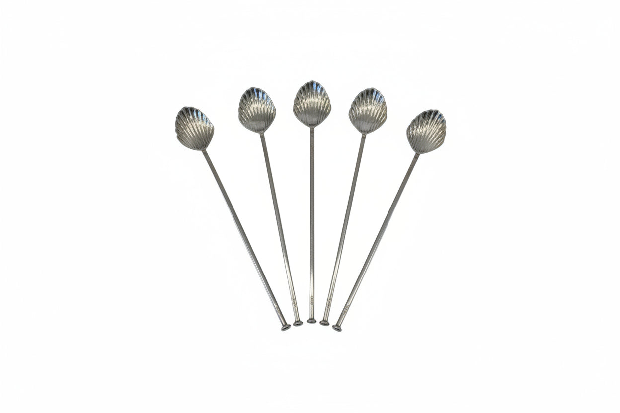 Five sterling silver shell-bowl sipper straws fanned out