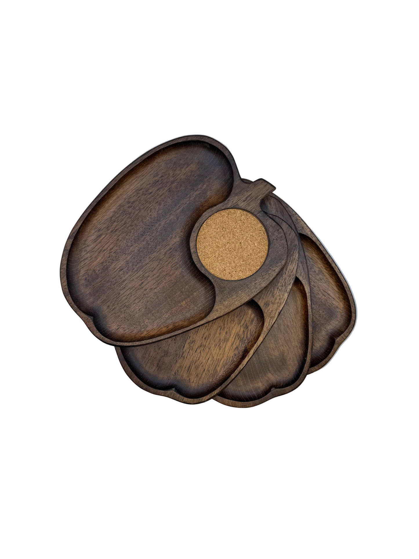 Set of vintage apple-shaped wooden snack trays with cork coaster wells, fanned in a stack