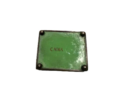 Underside of the enamel hinged box, green enamel with red 'CHINA' maker's mark