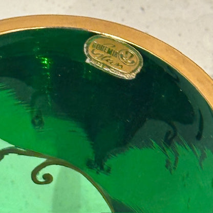 Close-up of the gilt rim with a Bohemia Glass foil label on the emerald green vase