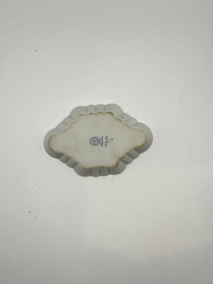 Underside of Herend oblong trinket dish showing blue Herend maker's mark