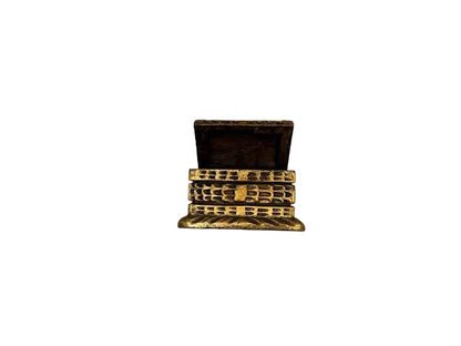 Gilt carved lattice wood box open, showing the dark hollow interior.