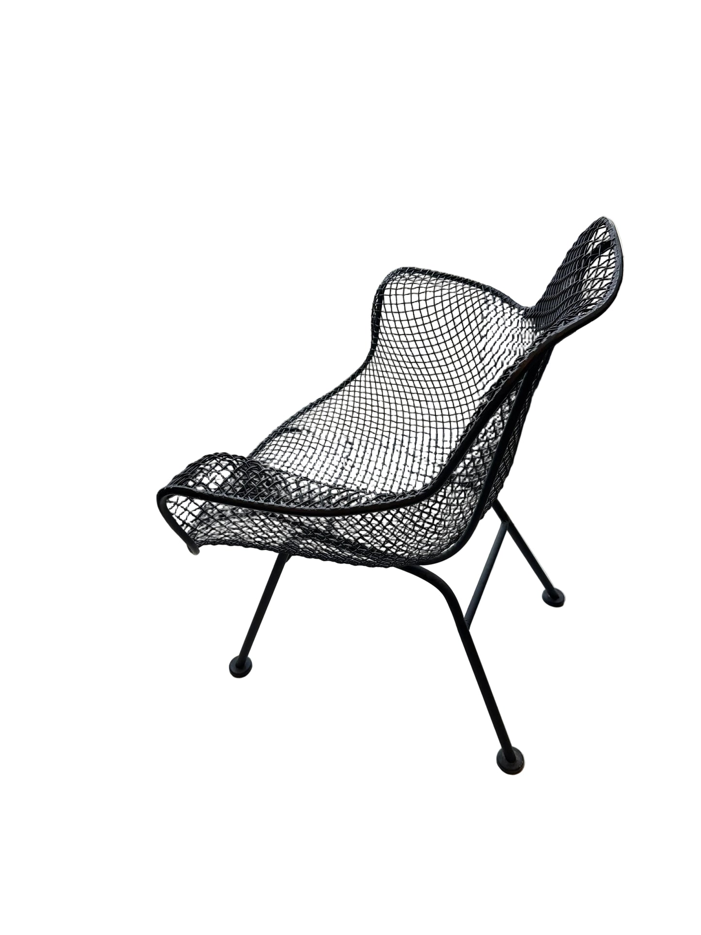 Side profile of black wire-mesh Russel Woodard Sculptura chair