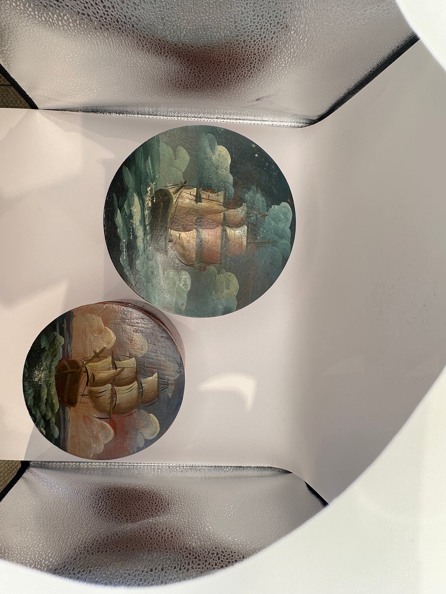 Three nesting box lids painted with tall ships at sea