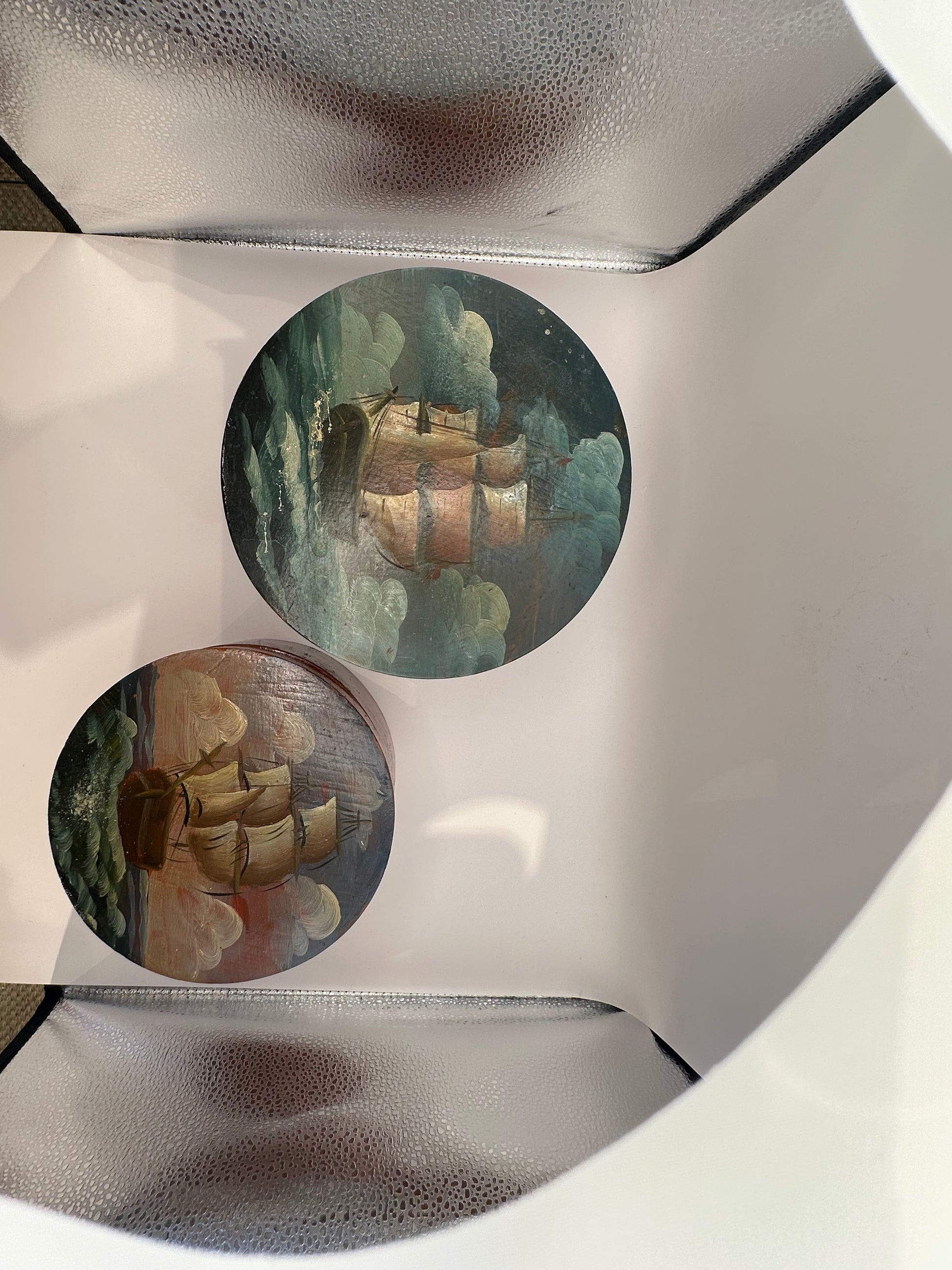 Three nesting box lids painted with tall ships at sea