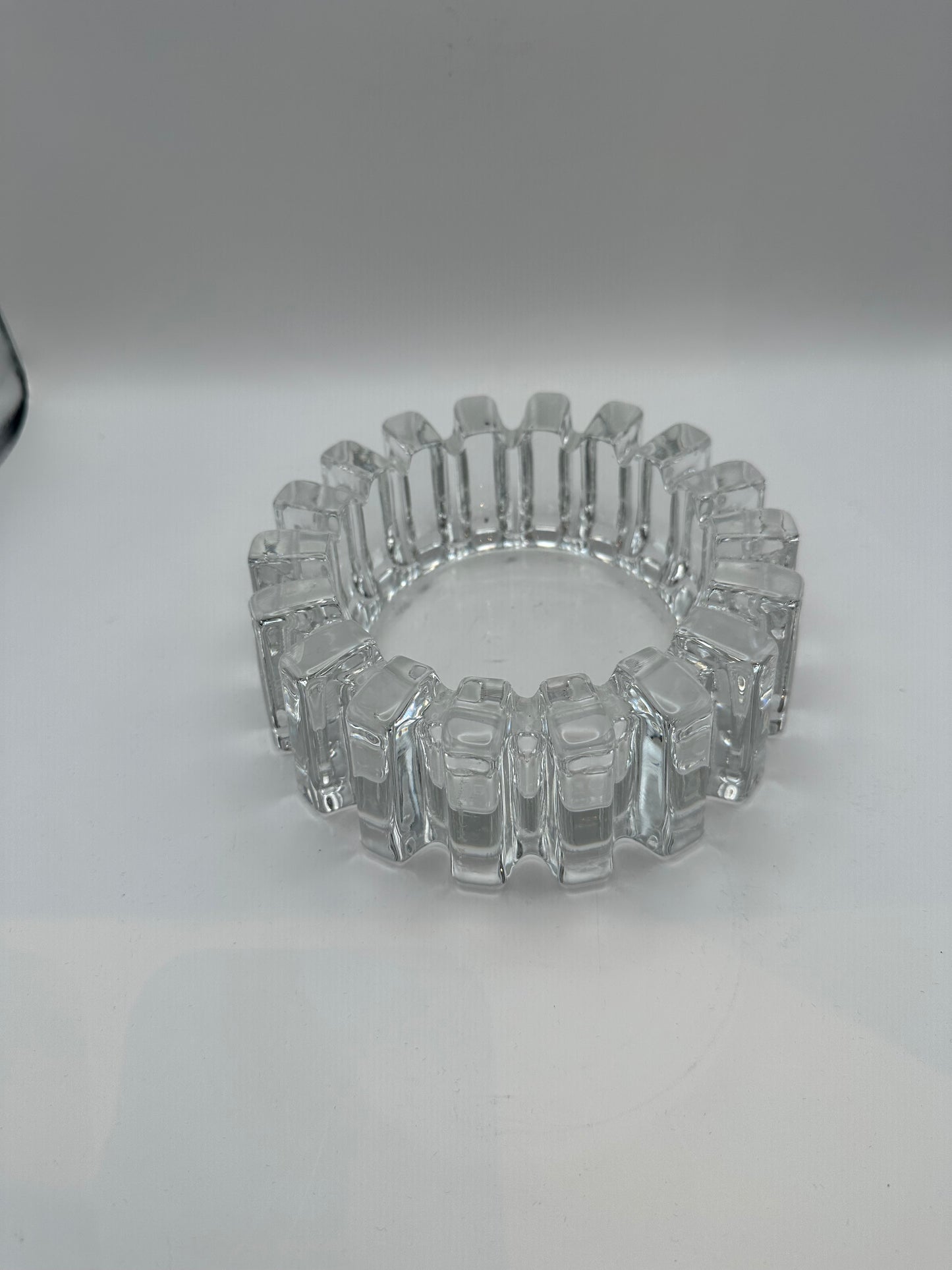 MCM notched clear glass dish, angled view showing thick faceted ribbed sides
