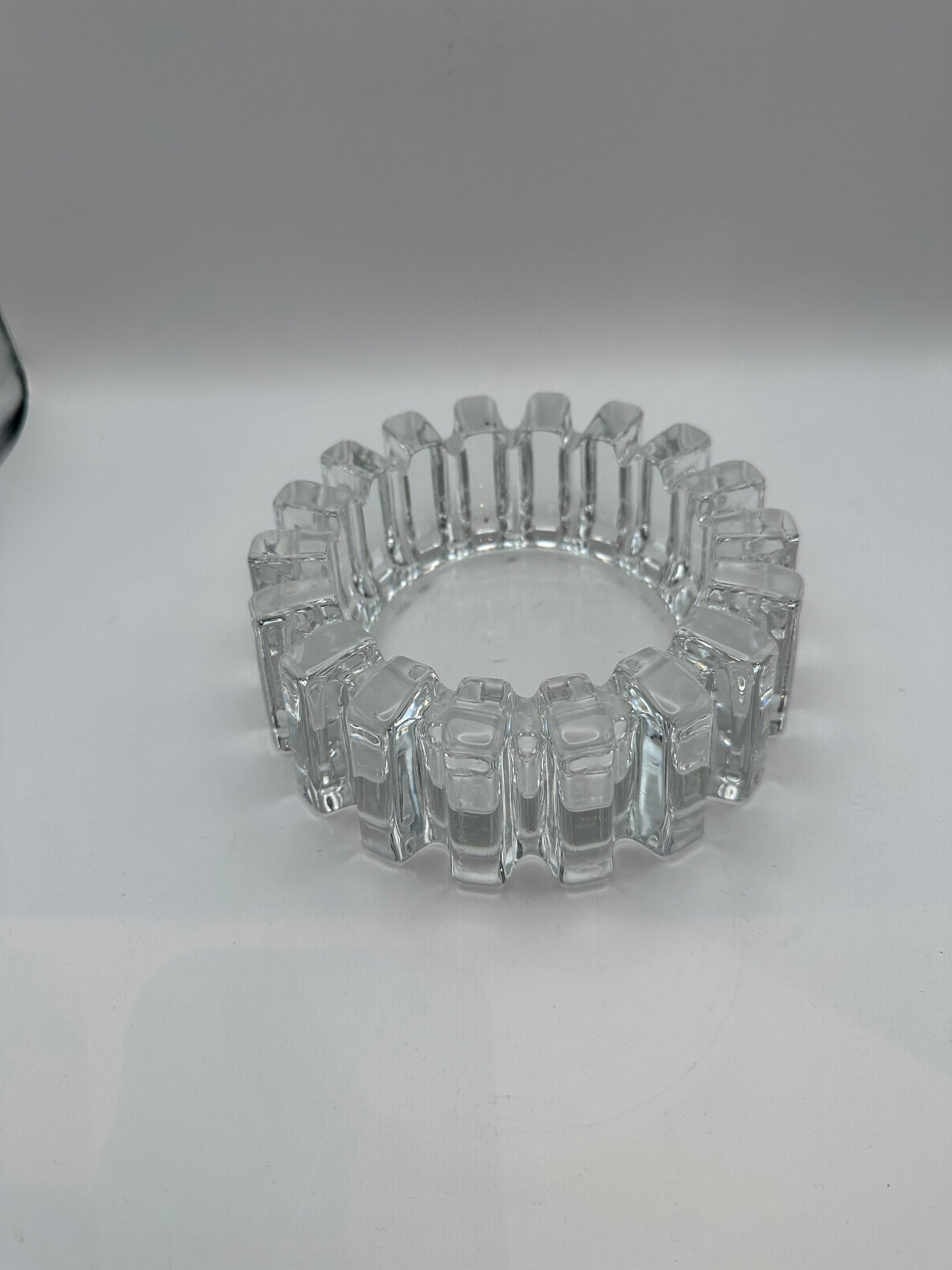MCM notched clear glass dish, angled view showing thick faceted ribbed sides