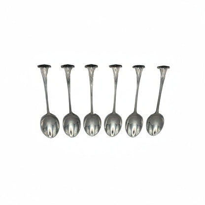 Set of six antique silverplate demitasse spoons with fanned scroll-shell handle terminals, oval bowls, displayed in a row