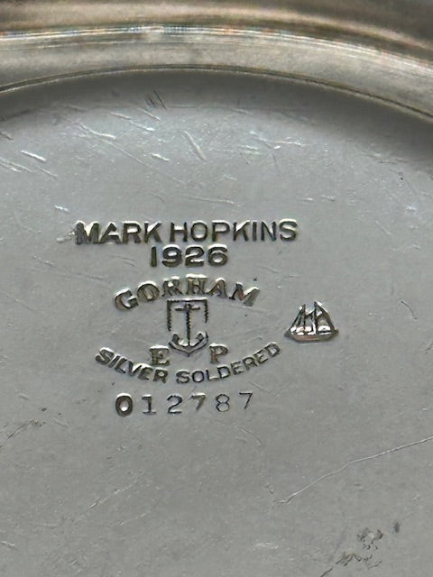Underside of Gorham tray showing Mark Hopkins 1926 hallmark and Gorham silver soldered mark