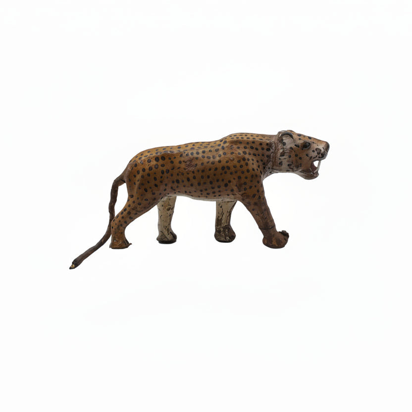Vintage hand-painted leather leopard figure, full side profile, snarling with open mouth and extended tail