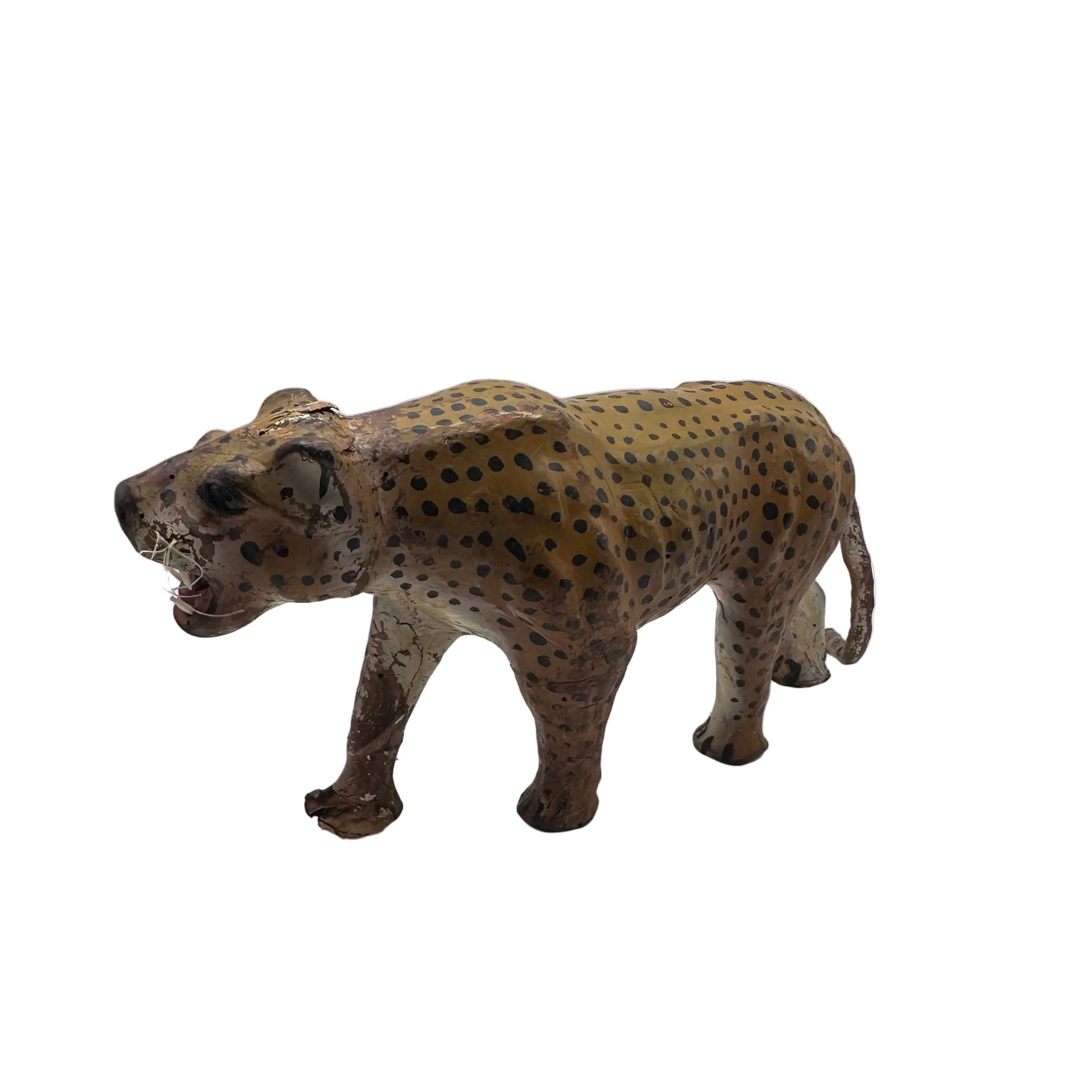Vintage leather leopard figure in three-quarter side view, snarling with worn painted coat