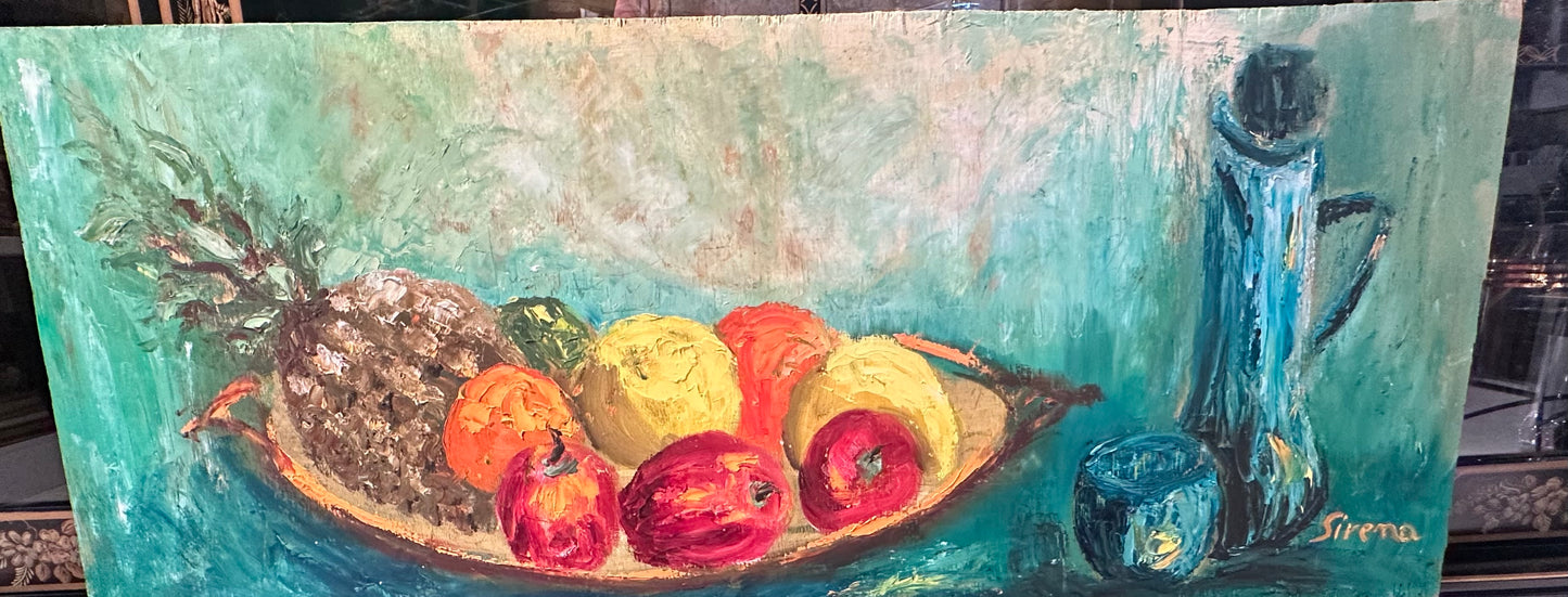 Vintage MCM still life on panel, wide view of fruit bowl, blue pitcher and glass on a teal ground, signed Sirena.