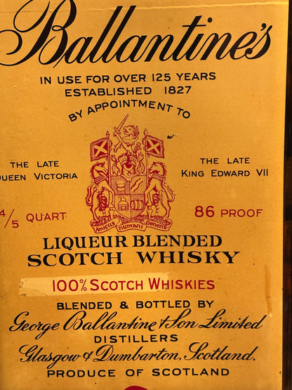 Detail of the aged Ballantine's label with crest, '86 proof' and distiller text