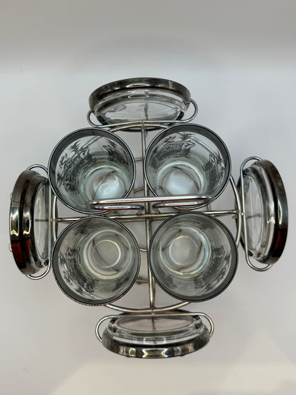 Top-down into the Kimiko barware caddy showing glass interiors and surrounding coasters.