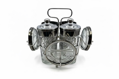 Vintage MCM Kimiko barware set: four silver-fade highball glasses and coasters in a chrome caddy.