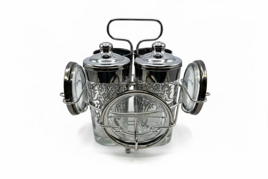Vintage MCM Kimiko barware set: four silver-fade highball glasses and coasters in a chrome caddy.