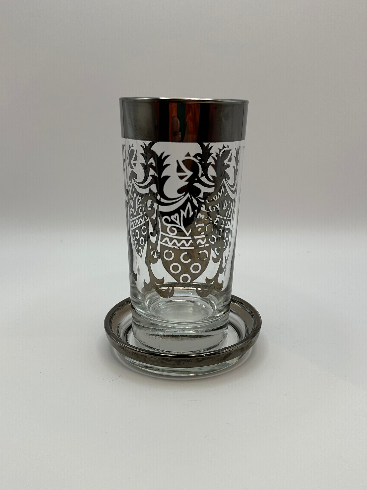 Kimiko silver-fade highball glass standing on its matching coaster.
