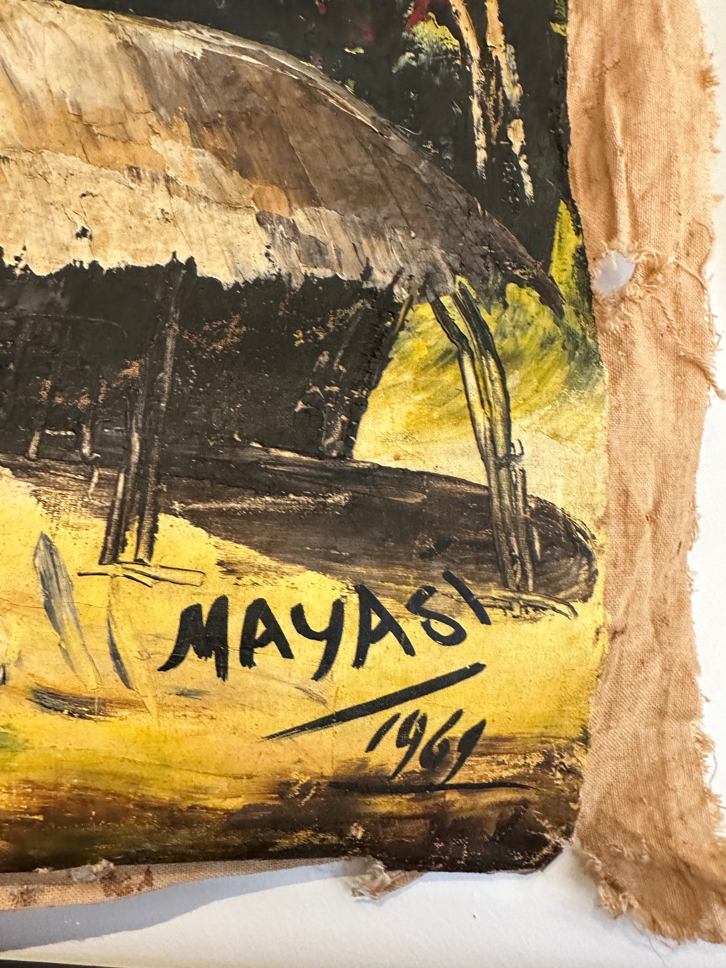 Close-up of painting's lower corner showing 'Mayasi 1969' signature and frayed flour-sack edge