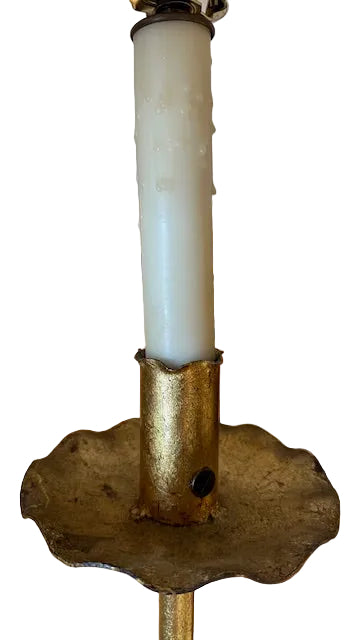 Close-up of the gilt lamp's gilded acanthus-leaf collar on the metal stem