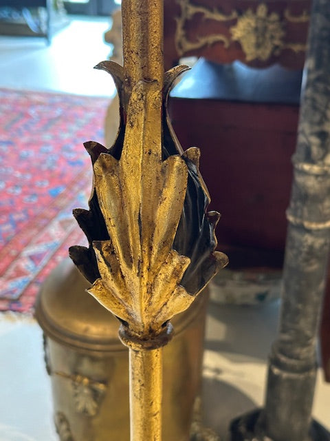 Close-up of the gilt lamp's faux-candle socket and scalloped drip-pan bobeche