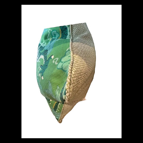 Jade dragon throw pillow, side view showing green print front and woven tan back