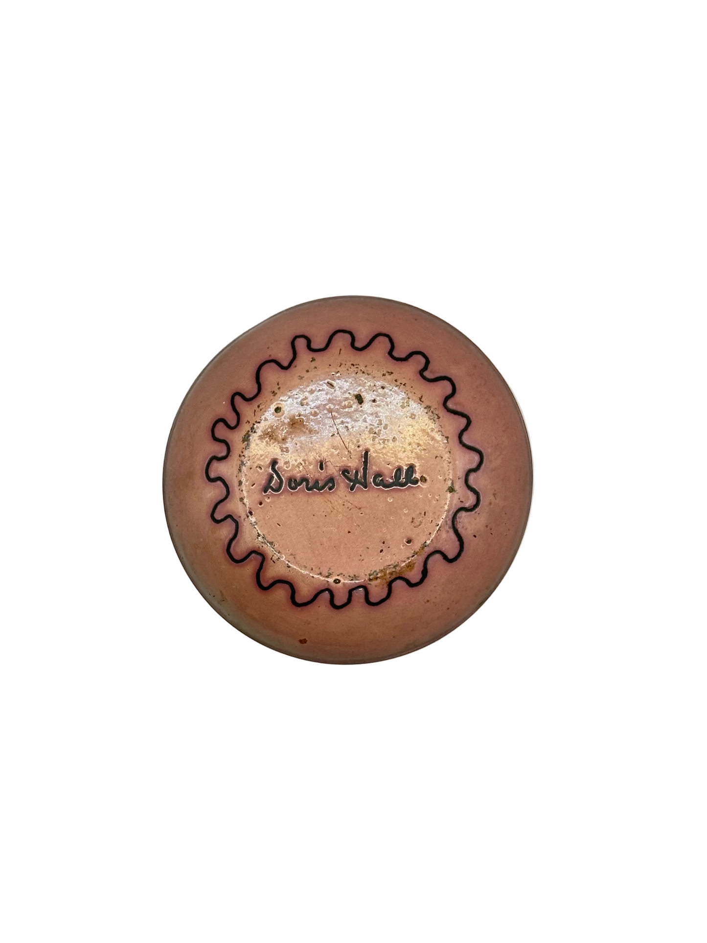 Underside of Doris Hall small dish, copper glaze with black scalloped wave ring, signed 'Doris Hall'
