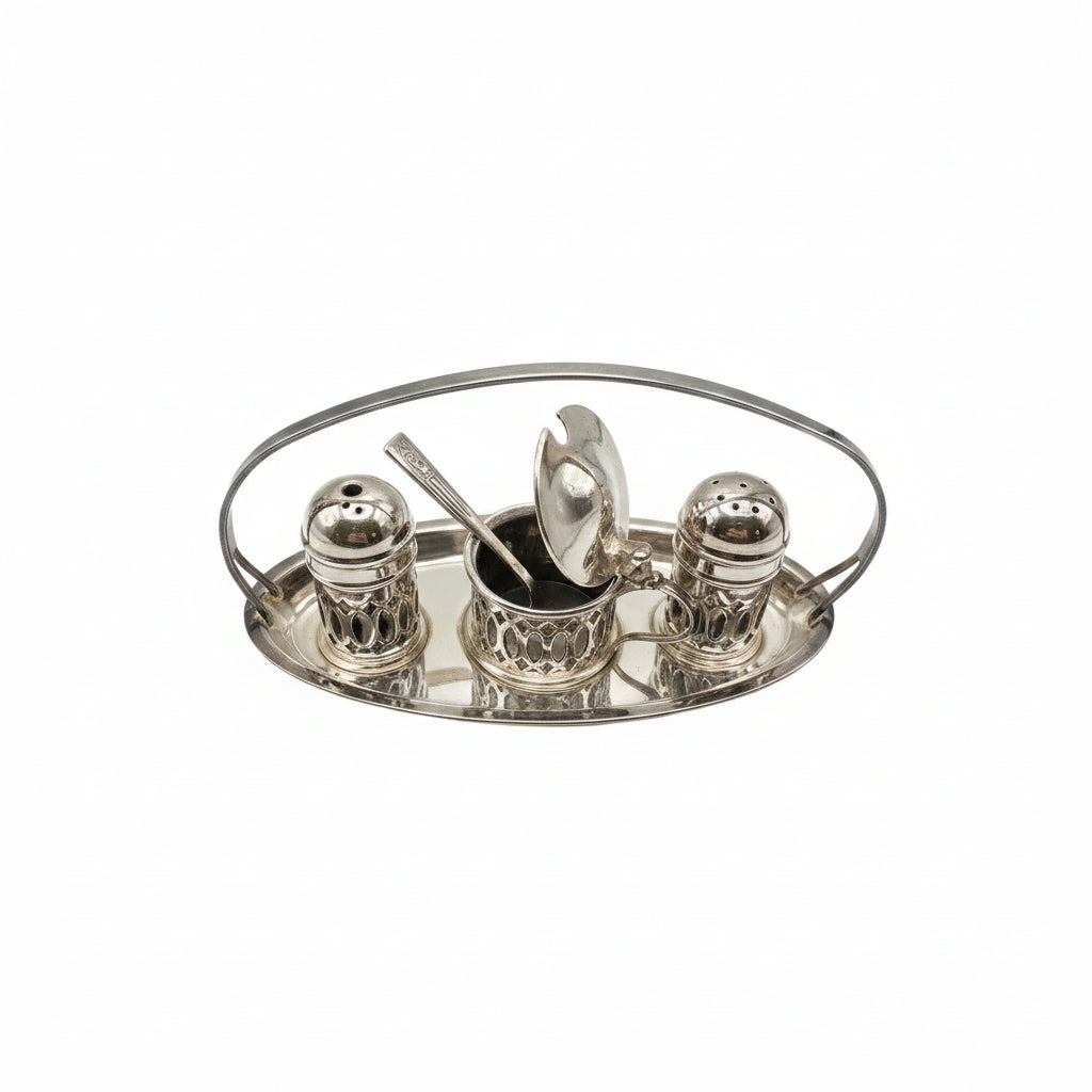Silverplate cruet set: mustard pot, salt and pepper shakers on handled oval stand