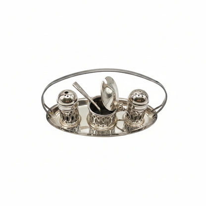Silverplate cruet set: mustard pot, salt and pepper shakers on handled oval stand