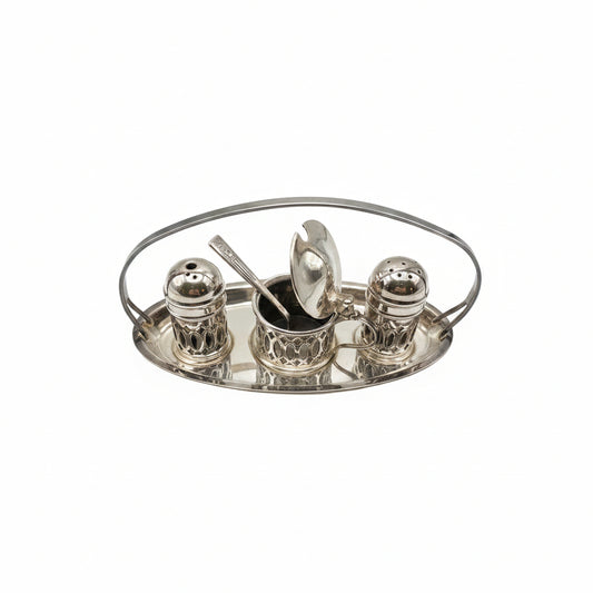 Silverplate cruet set: mustard pot, salt and pepper shakers on handled oval stand