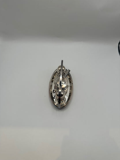 Top-down view of silverplate cruet set in its oval carrying stand