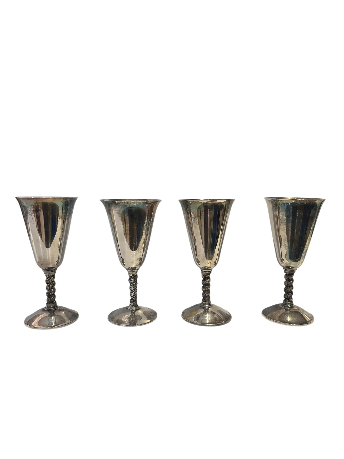 Set of four silver-plated vine-stem goblets lined up, front view