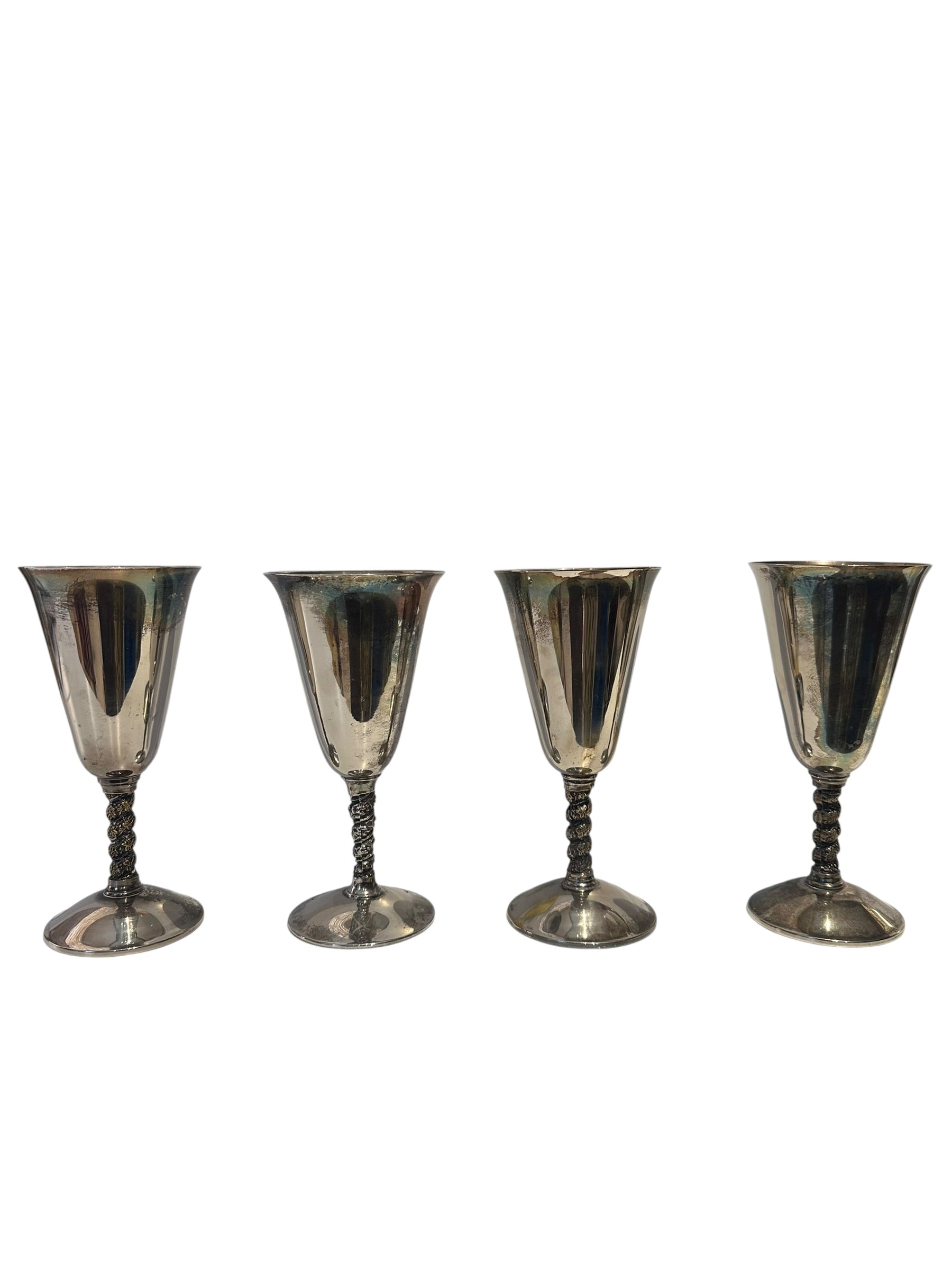 Set of four silver-plated vine-stem goblets, front view on white background