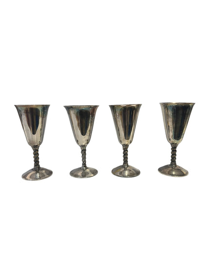 Set of four silver-plated goblets with vine-wrapped stems, angled view