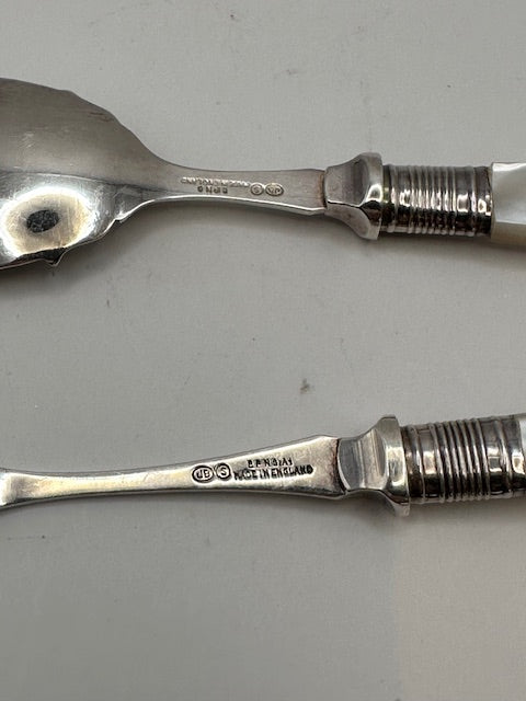 Close-up of fork and spoon handles showing EPNS 'Made in England' hallmarks and ferrules