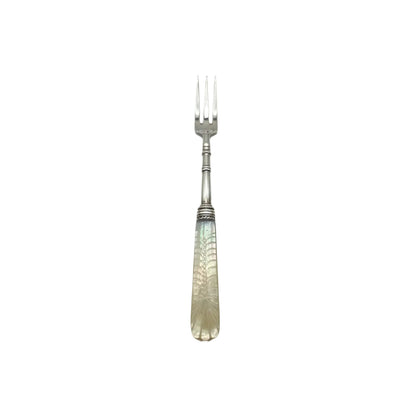 Three-tine sterling fork with carved mother-of-pearl handle, front view