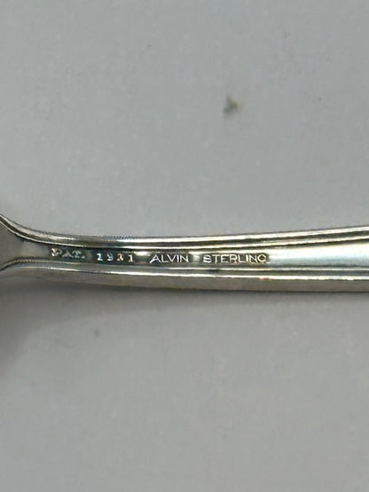 Close-up of maker's mark reading PAT. 1921 Alvin Sterling on handle back