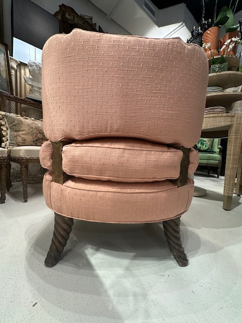 Antique pink coral boudoir chair, rear view revealing carved wood legs and curved back