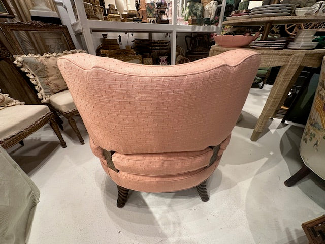 Antique pink coral boudoir chair, rear three-quarter view of curved tufted back and barley-twist legs