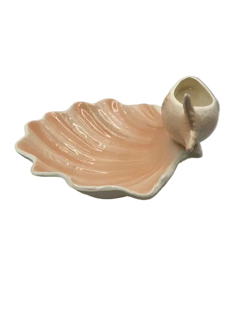 Angled view of the peach lustre shell dish with fish-form bowl, from above