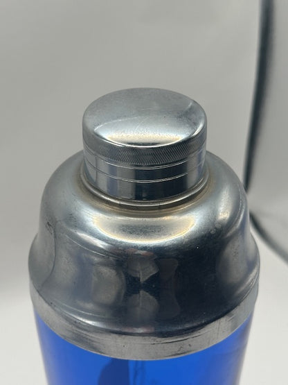 Close-up of the chrome screw cap and lid on the cobalt sailboat cocktail shaker