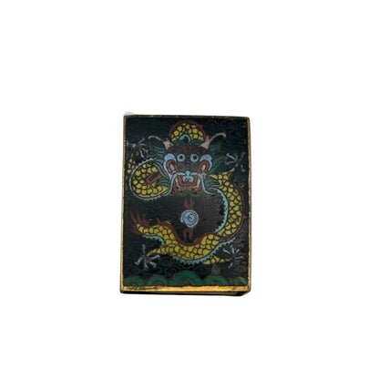 Close-up front of the black cloisonne cover detailing the colorful dragon and flaming pearl