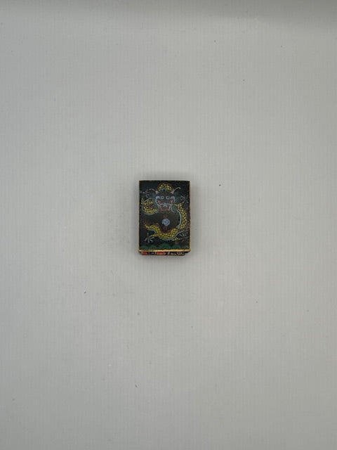 Black dragon cloisonne matchbox cover shown small on a white background