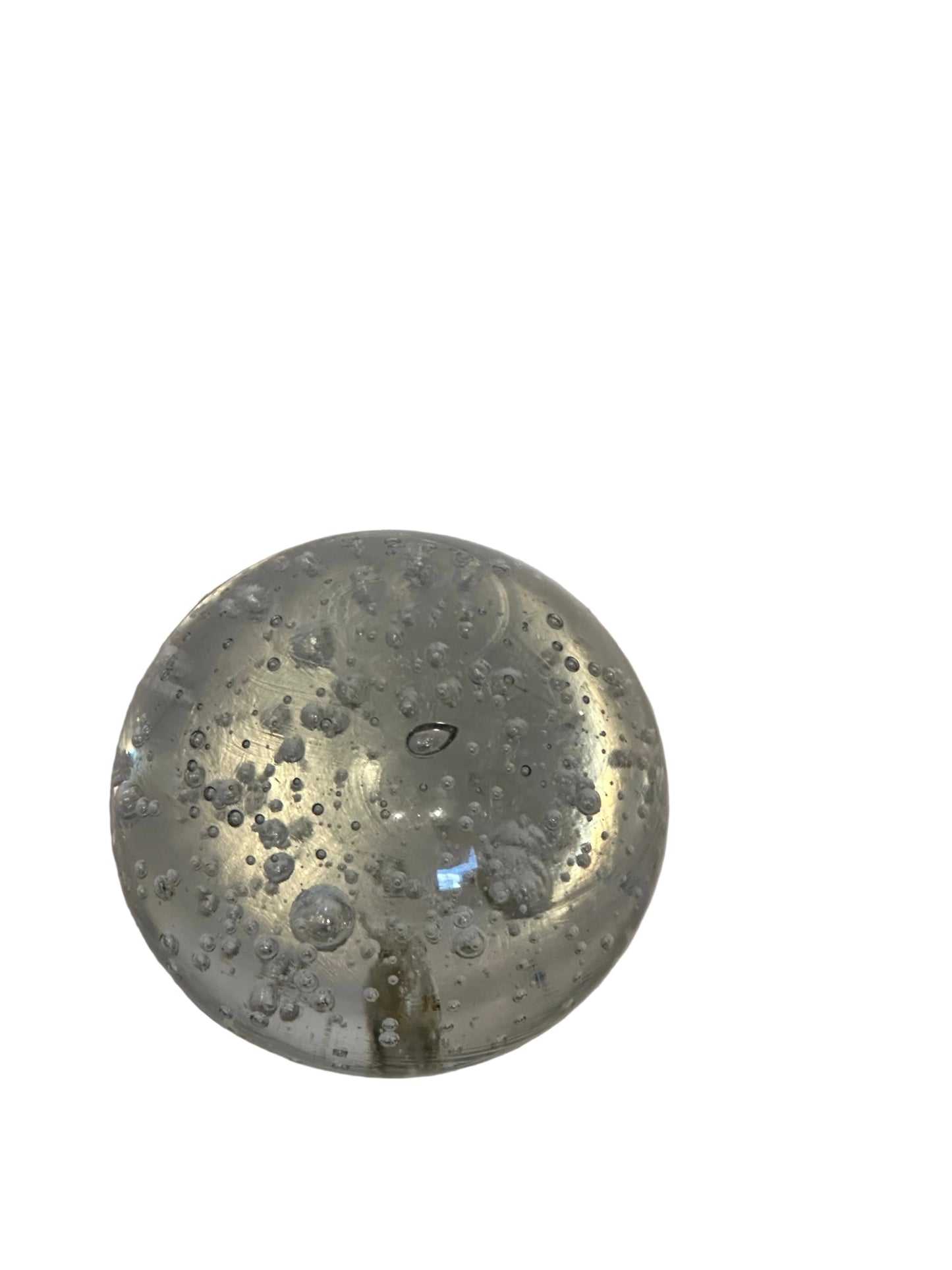 Top view of vintage bubble glass sphere showing central pontil mark and internal bubbles